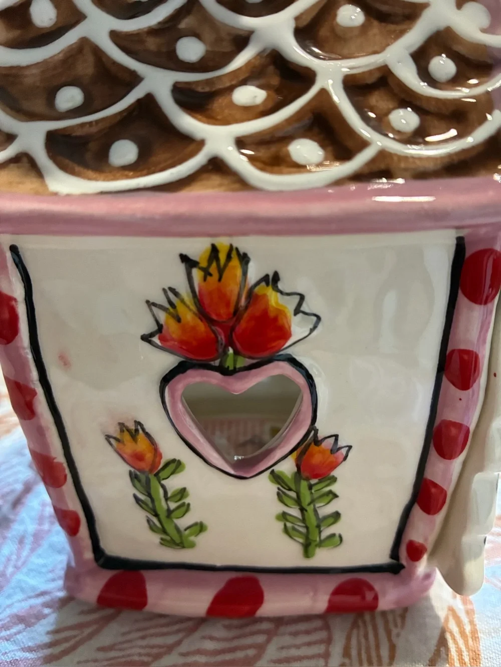Blue Sky “The Gingerbread Cottage”. In new condition. Pink, brown, red & green.